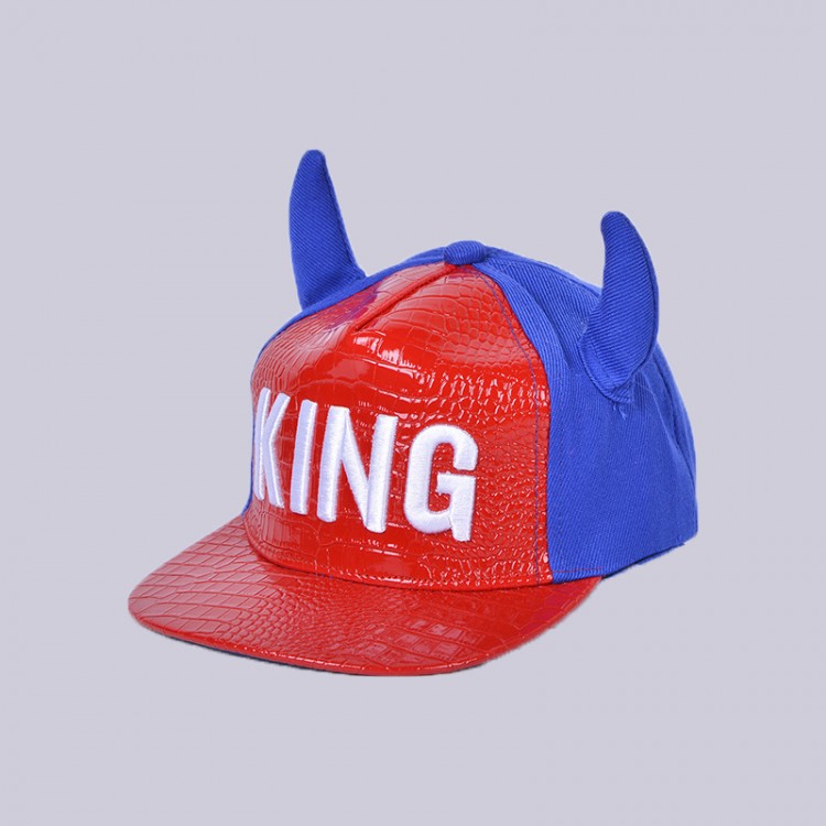 Metallic horn snapback cap